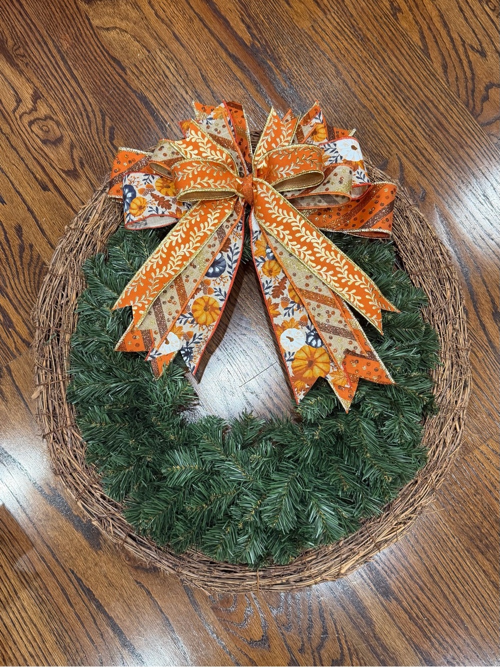 Autumn Grapevine Wreath with Green Pine and Orange Harvest Bow